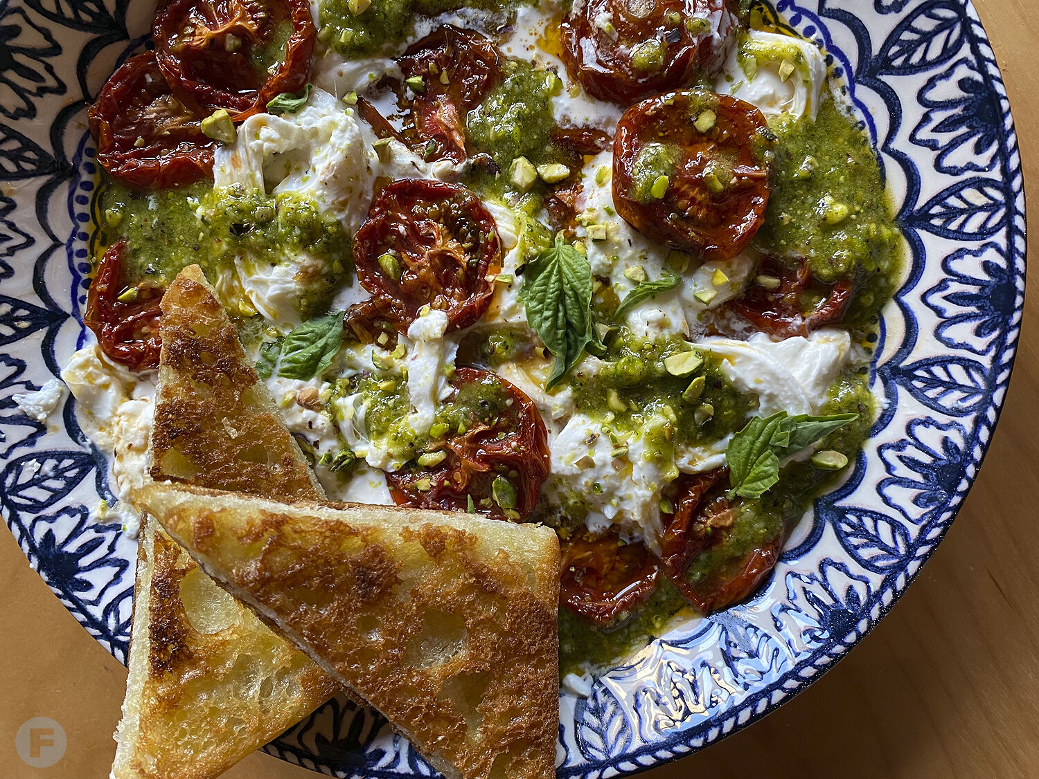 Burrata with Roasted Tomatoes and Pistachio Pesto